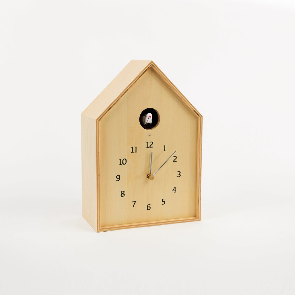 Wooden cuckoo clock on a white background