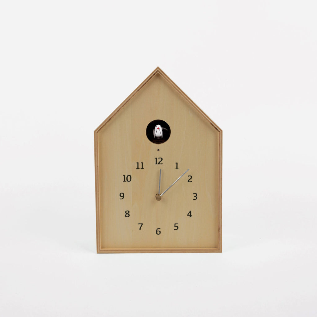 Wooden cuckoo clock on a white background