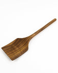 Wooden spatula on a white background