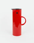 Red plastic thermal pitcher on a white background