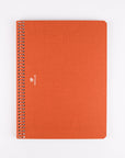 Orange spiral-bound notebook on a white background
