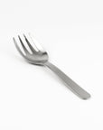 Silver fork on a white background