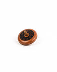 Wooden spinning top on a white background