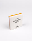 Notebook with 'MOTTAINAI MEMO' text on a white background