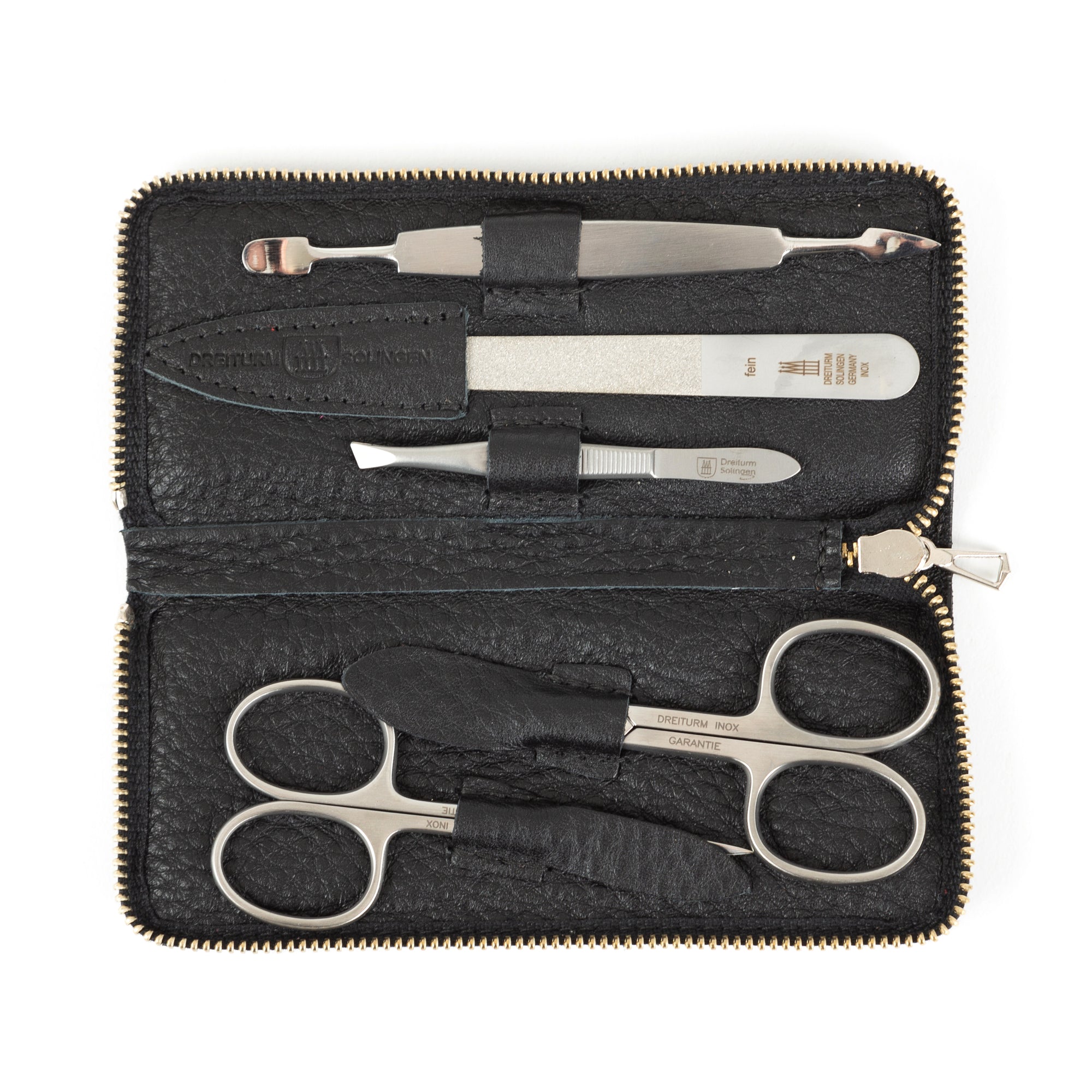 A five piece manicure set with stainless steel tools and black leather case, including nail scissors, cuticle scissors, a manicure instrument, nail file, and tweezers.