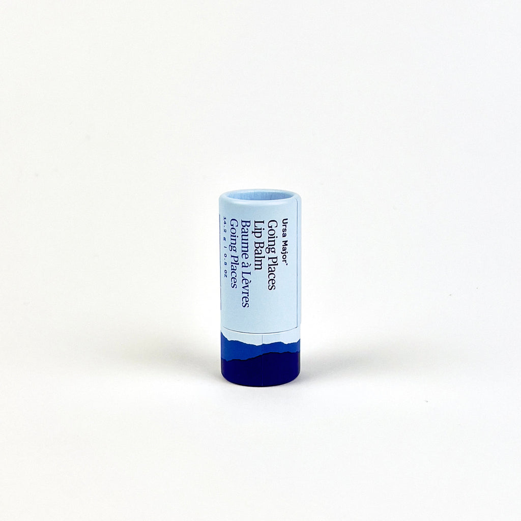 Blue lip balm stick on a white background