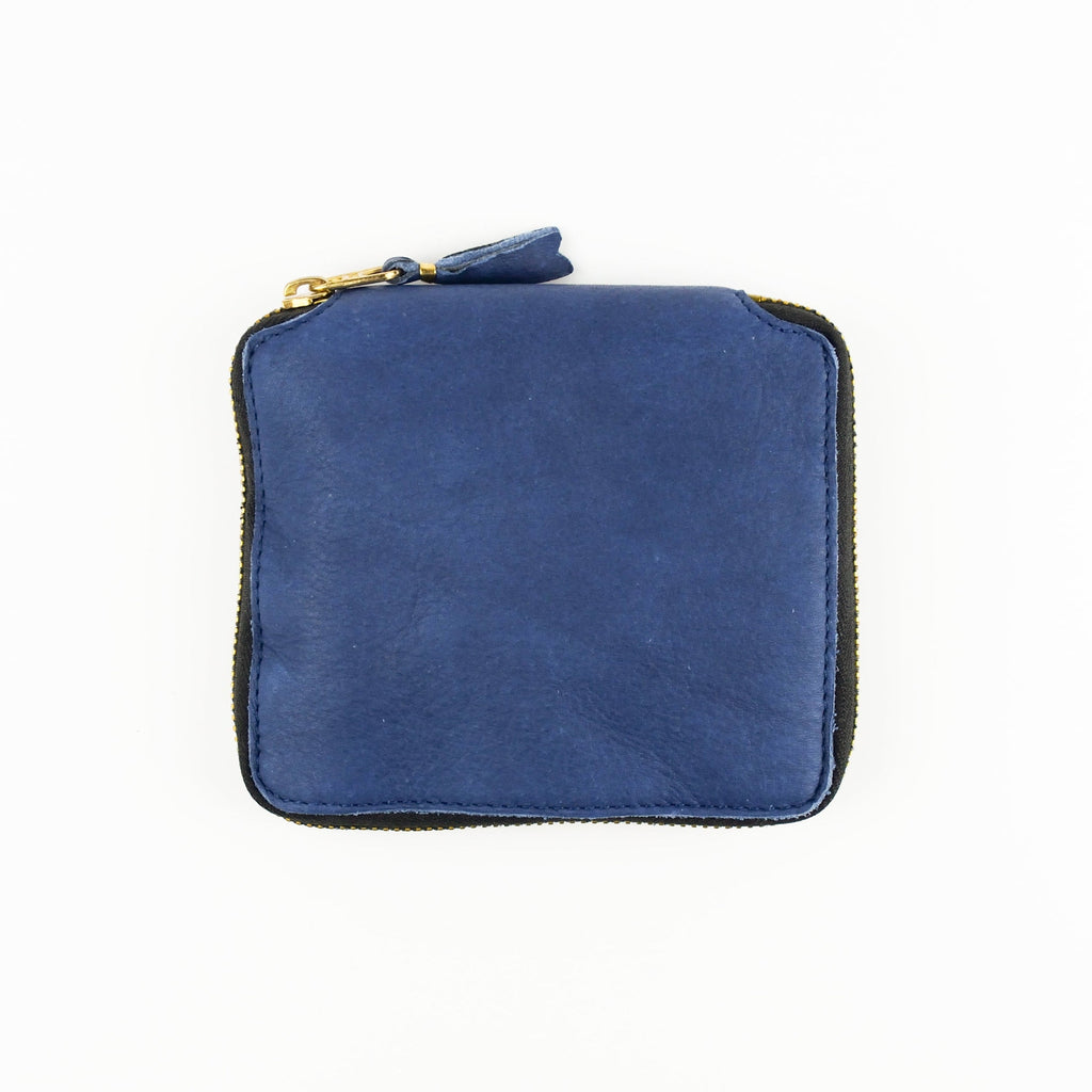 Blue wallet with distressed texture with a gold zipper on a white background
