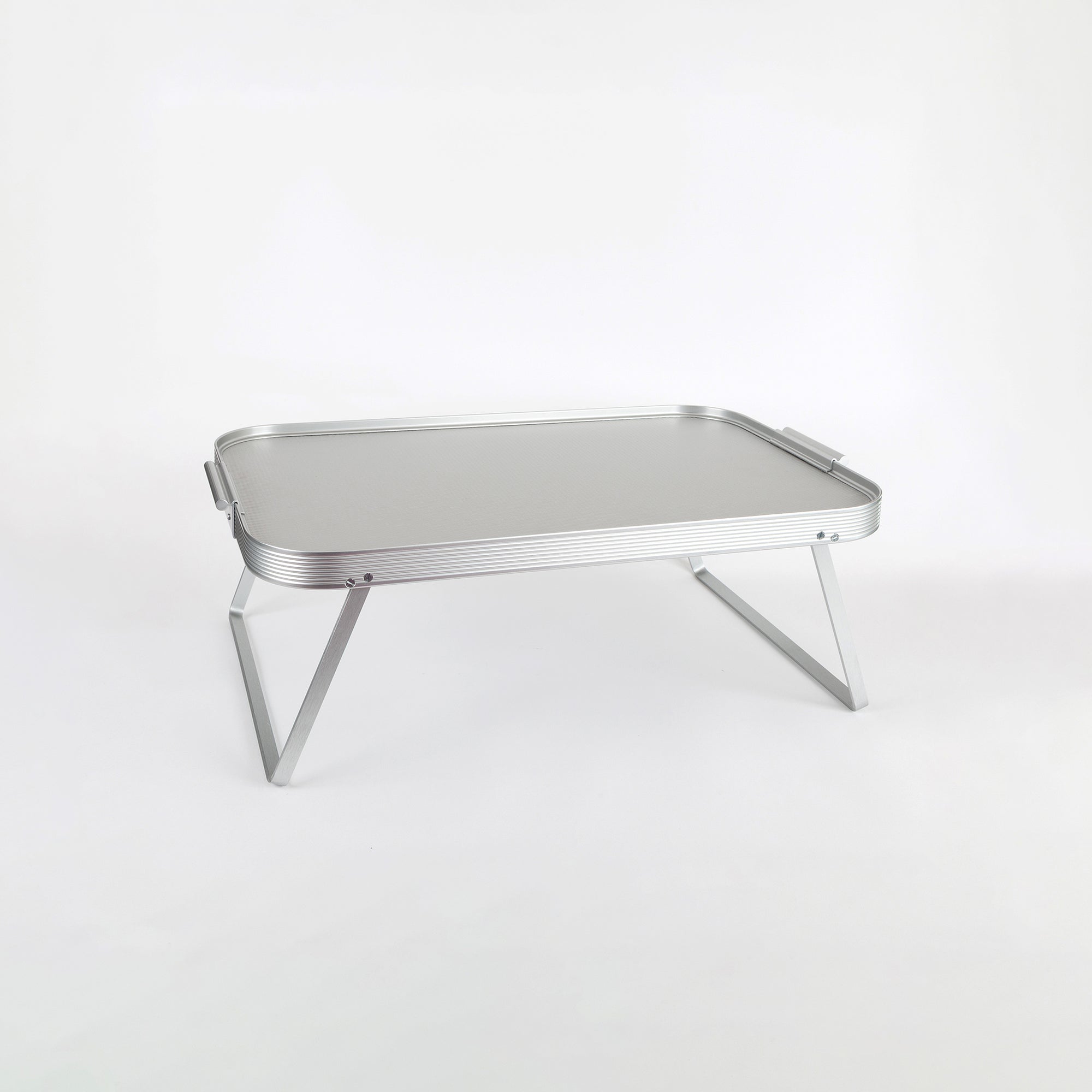 A silver anodized aluminum Kaymet Lap Tray with a ribbed extruded edge and handle sections, displayed on a white background.