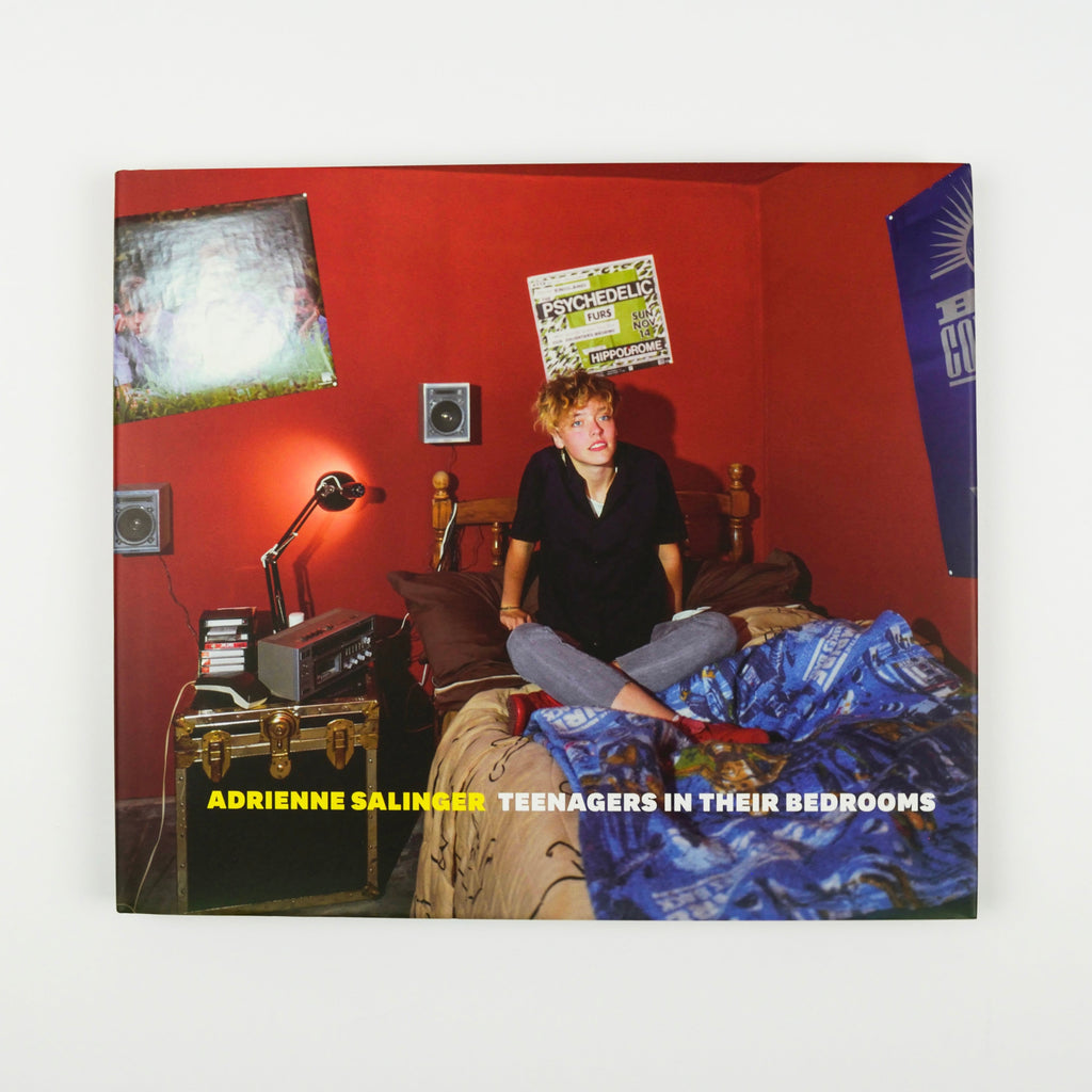 Book cover of 'Teenagers in Their Bedrooms' by Adrienne Salinger with a person sitting on a bed in a bedroom.