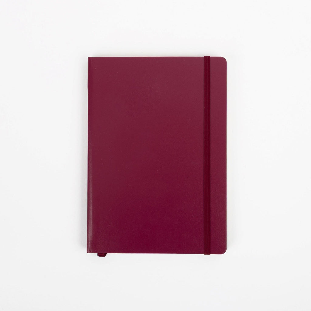 Maroon notebook on a white background
