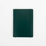 Green notebook on a white background