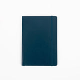 Blue notebook on a white background