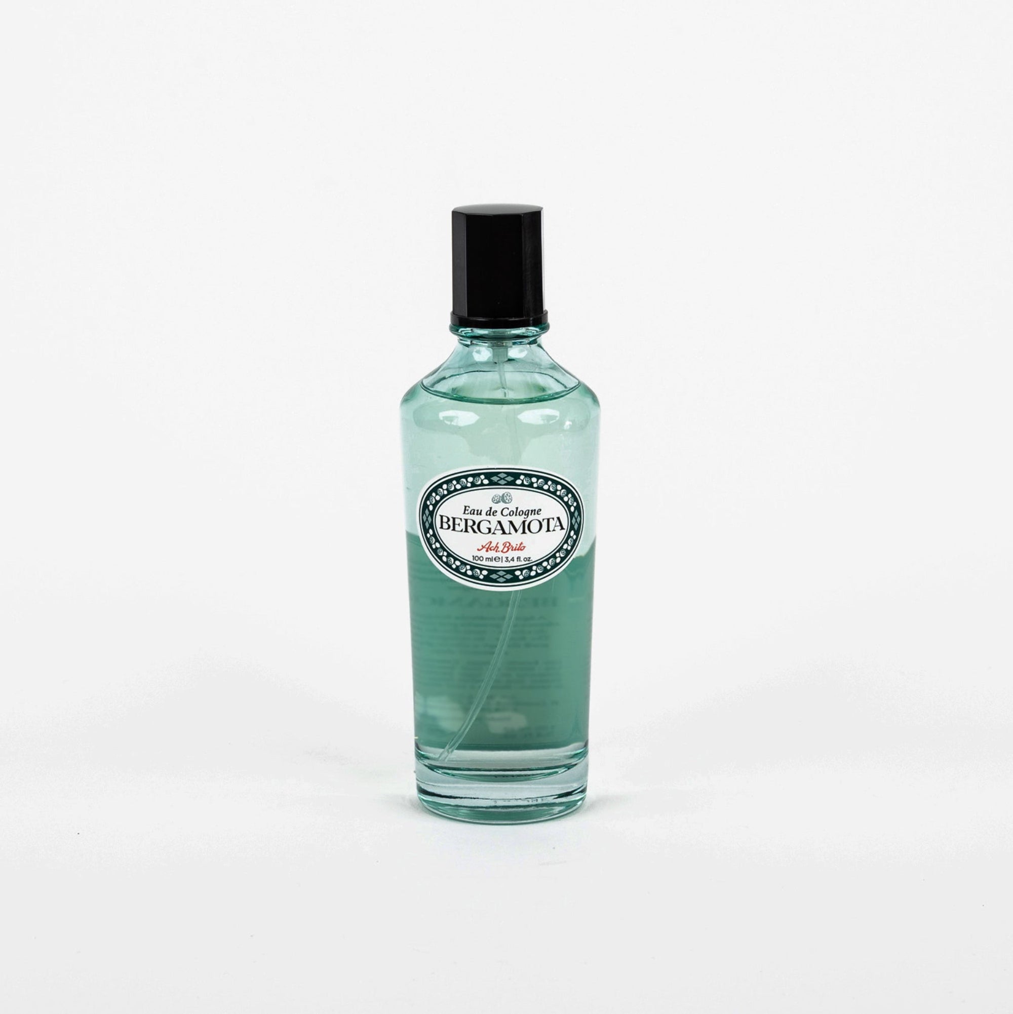 Clear bottle with black cap on a white background