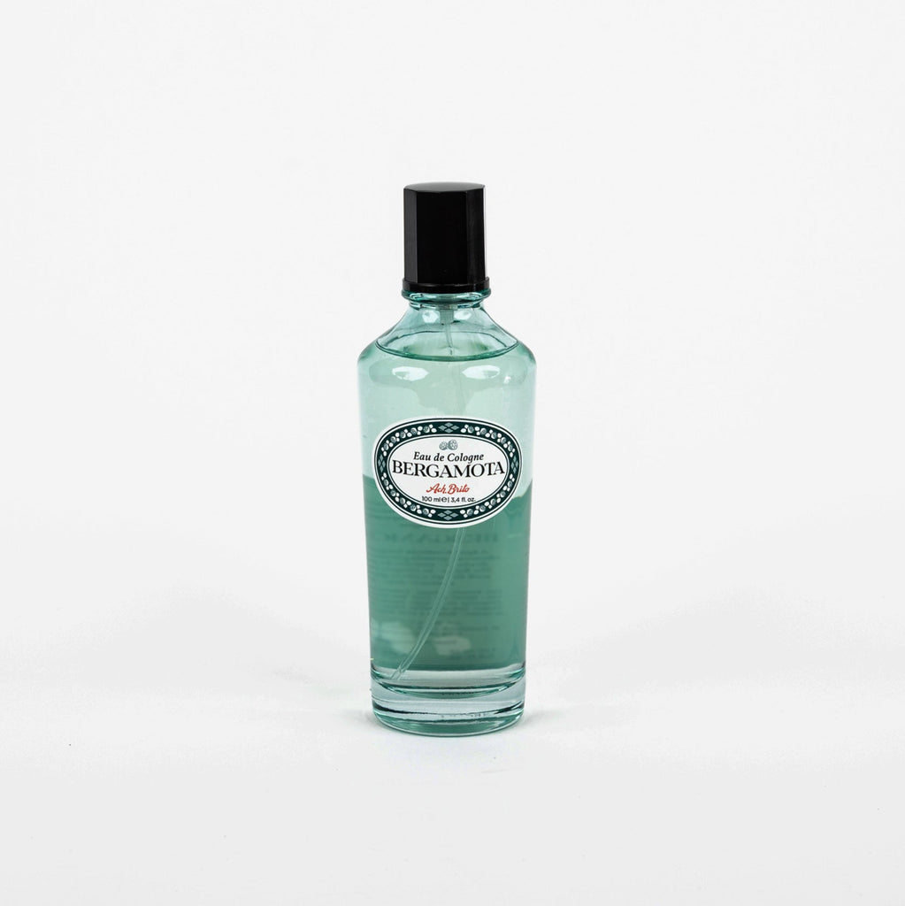 Clear bottle with black cap on a white background