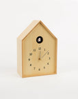 Wooden cuckoo clock on a white background
