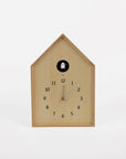 Wooden cuckoo clock on a white background