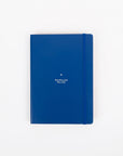 Blue notebook with text on a white background
