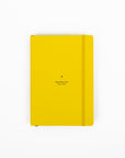 Yellow notebook with text on a white background