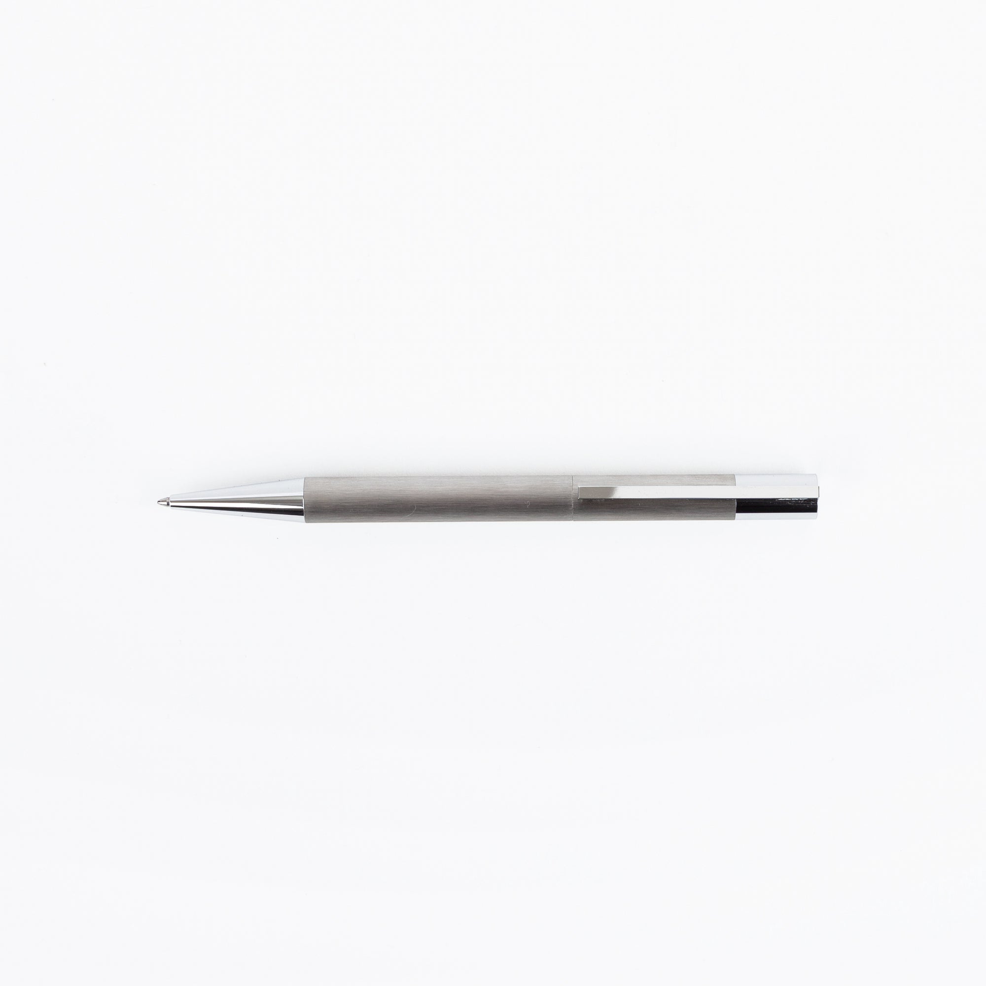 Silver pen on a white background