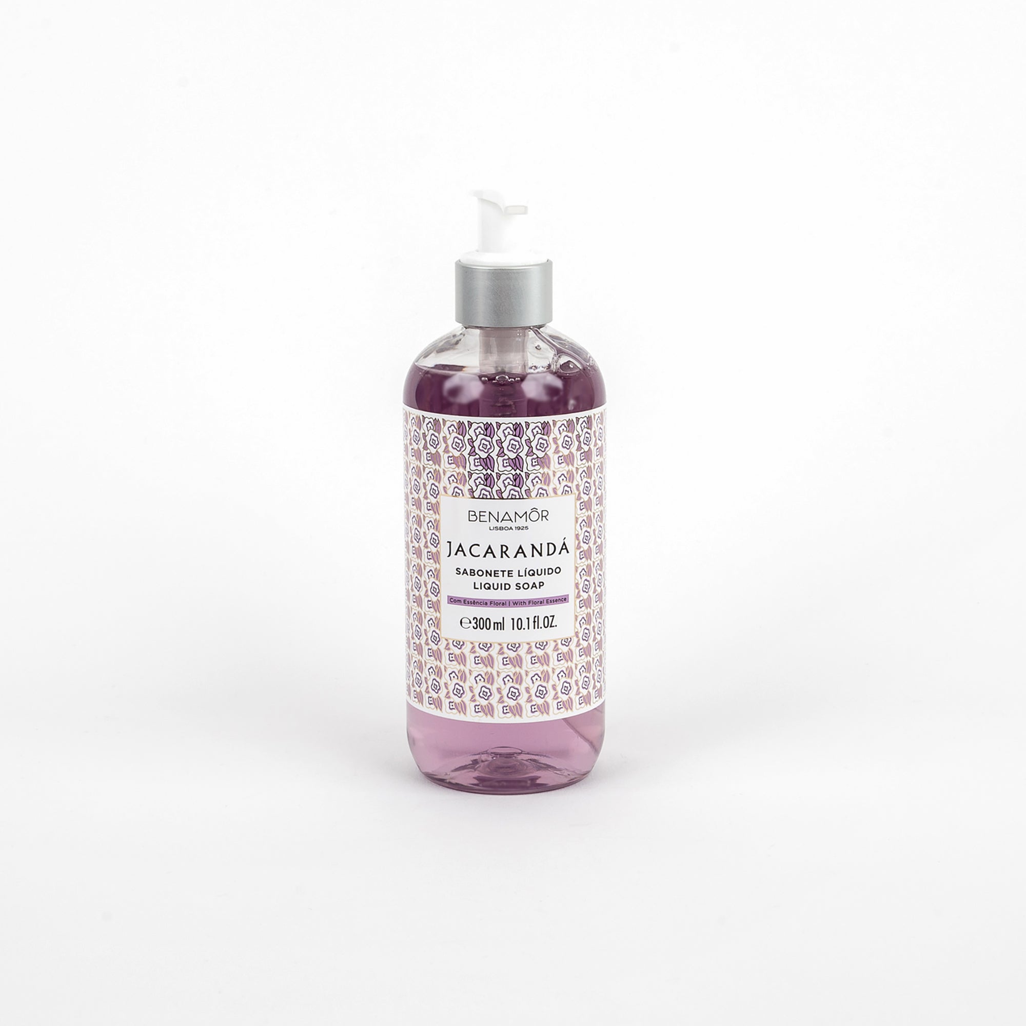 Bottle of Jacaranda liquid soap with decorative label on a white background