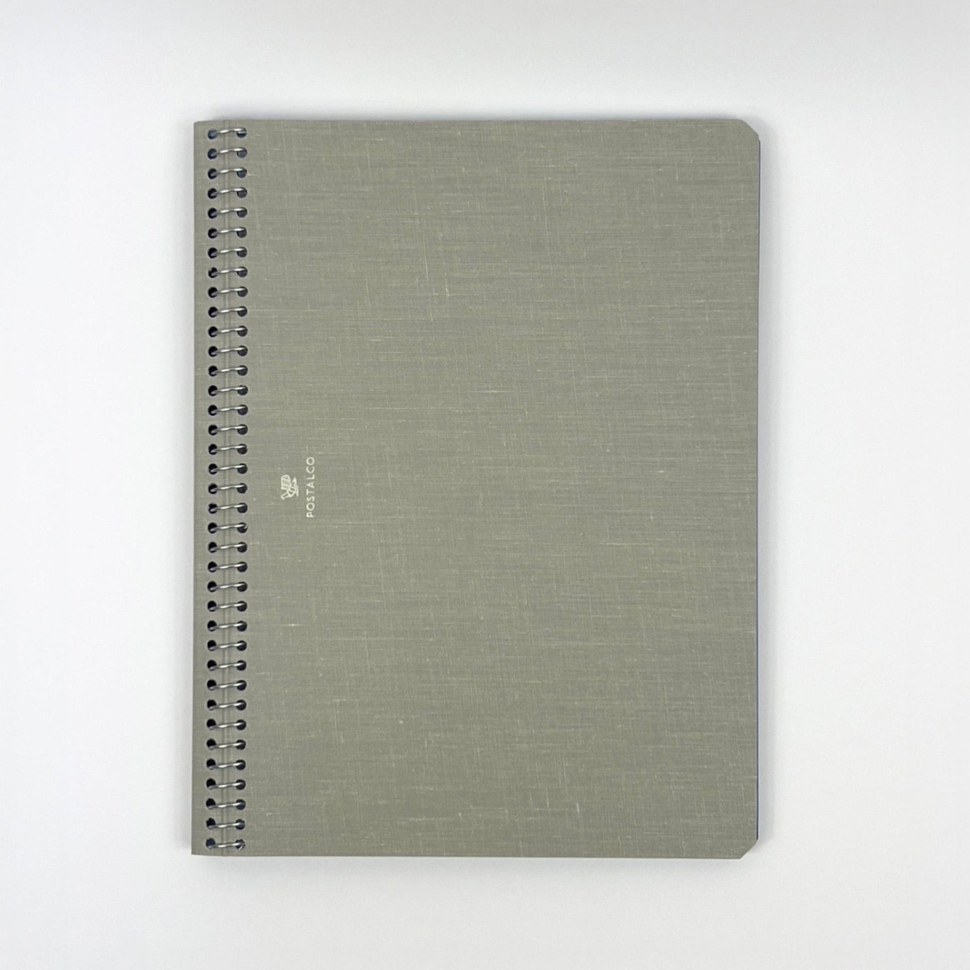 Gray spiral-bound notebook on a white background