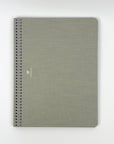 Gray spiral-bound notebook on a white background