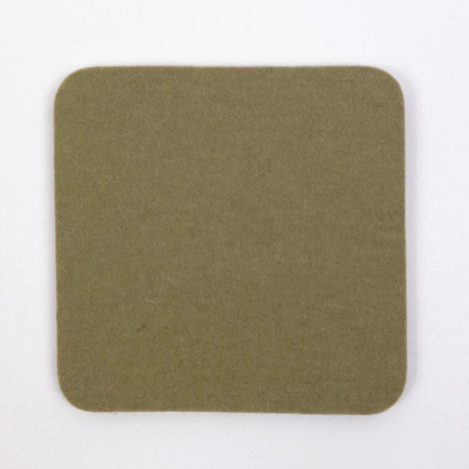 Square green fabric swatch on a white background
