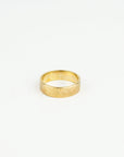 Gold ring on a white background