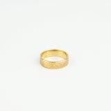 Gold ring on a white background