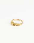 Gold ring on a white background