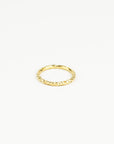 Gold ring on a white background