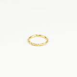 Gold ring on a white background