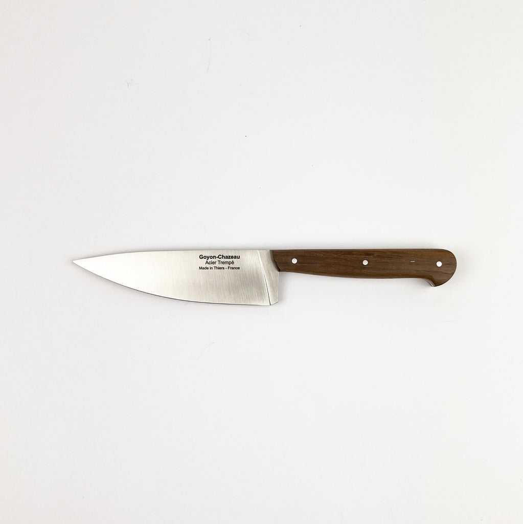 Chef's knife with a wooden handle on a white background