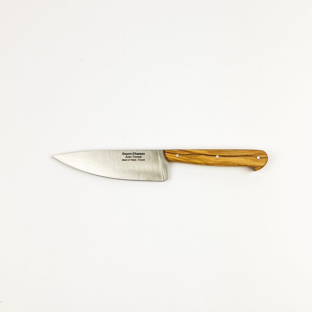 Chef's knife with wooden handle on a white background