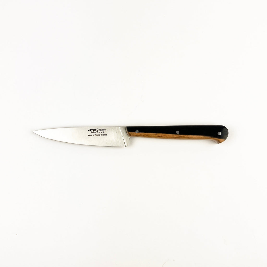 Knife with a black handle on a white background
