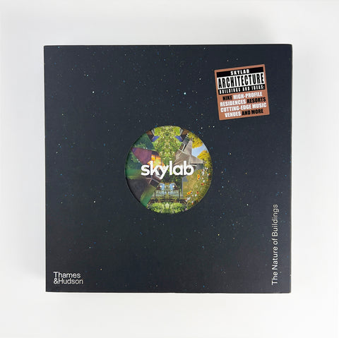 Book cover of 'The Nature of Buildings' by skylab with a circular image of a building on a black background.