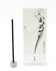 Incense stick with packaging featuring smoke design on a white background