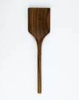 Wooden spatula on a white background