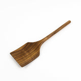 Wooden spatula on a white background