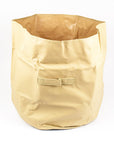 Beige tarp material bucket with white handle on a white background