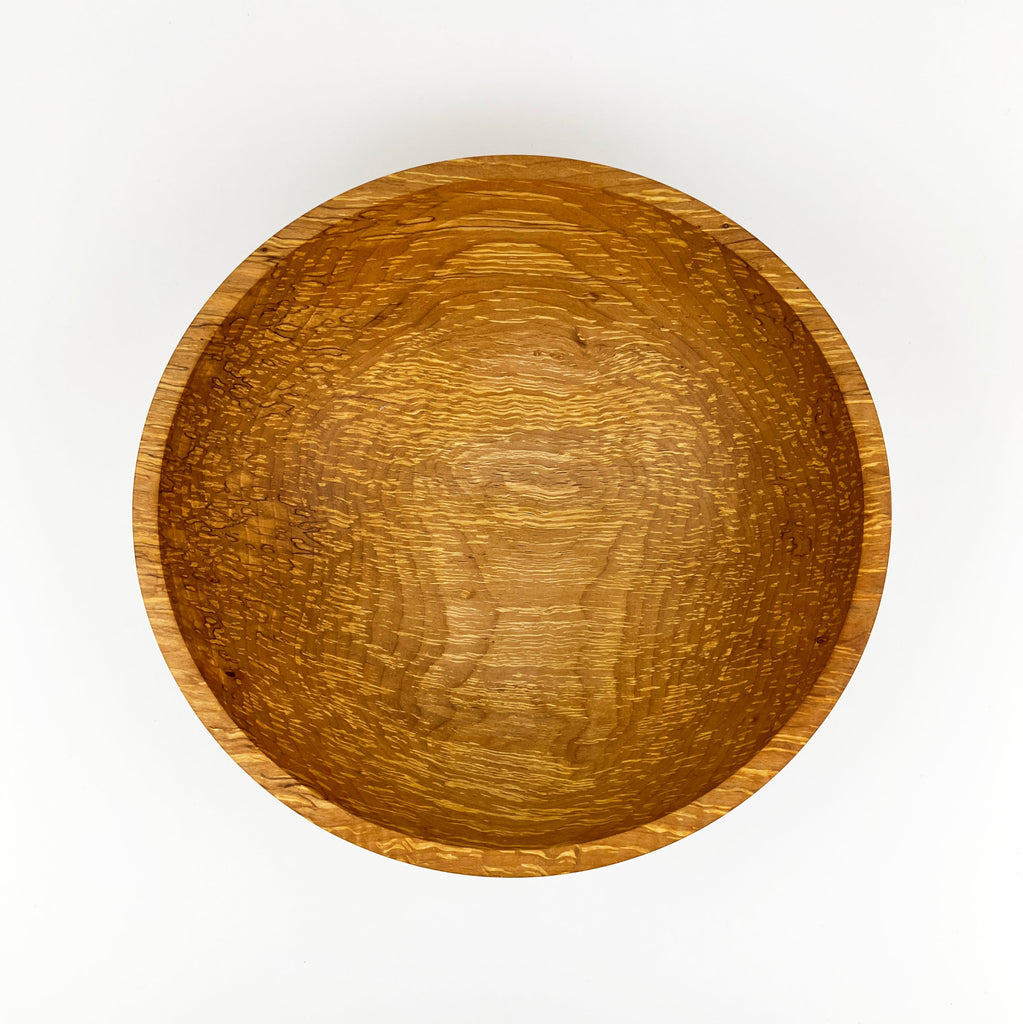 Wooden bowl on a white background