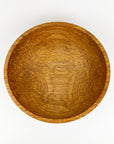 Wooden bowl on a white background