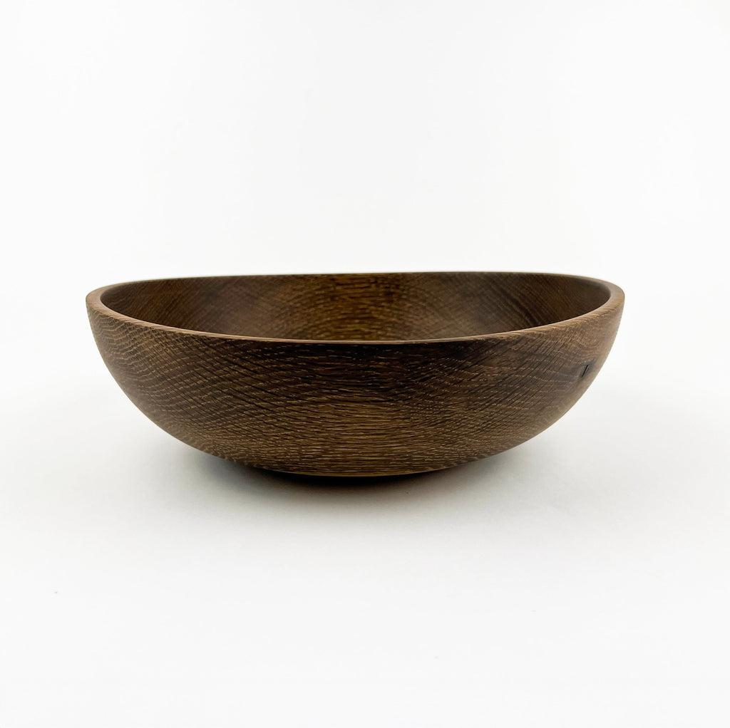Wooden bowl on a white background
