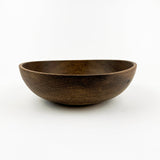 Wooden bowl on a white background