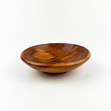 Wooden bowl on a white background