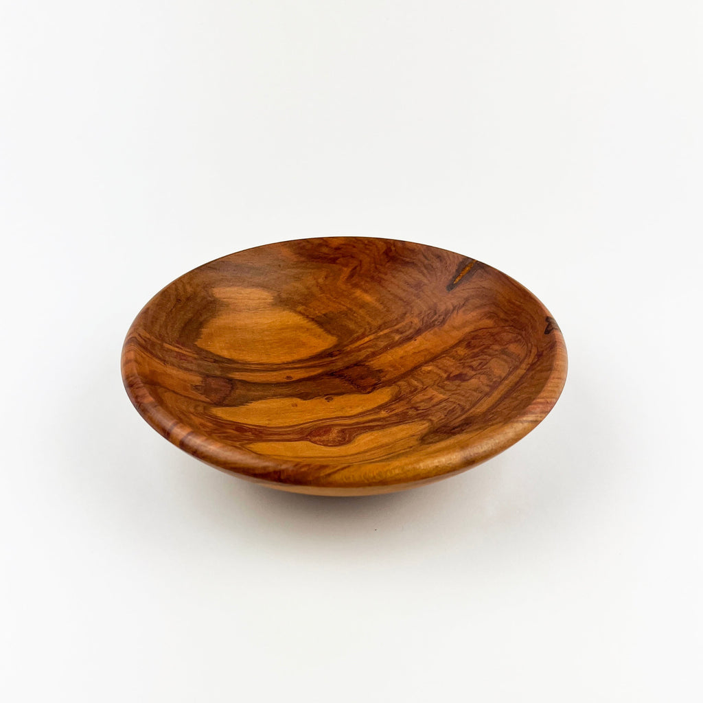 Wooden bowl on a white background
