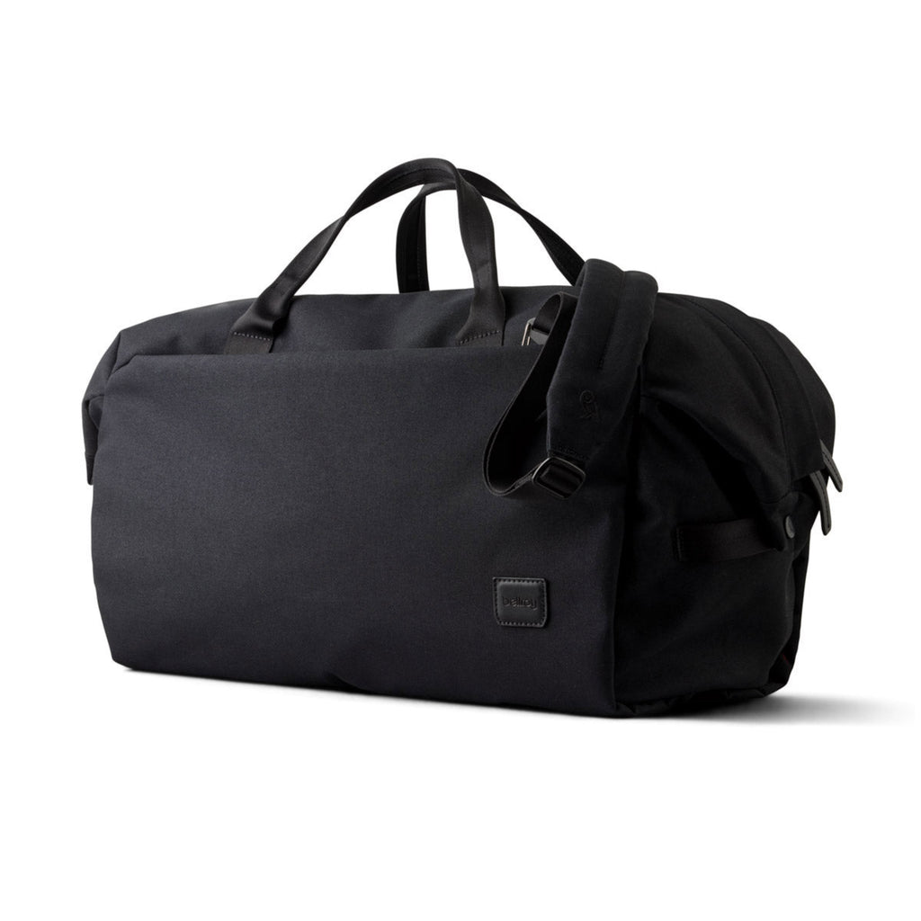Black duffel bag on a white background