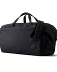 Black duffel bag on a white background