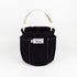 Black canvas bucket with a white handle on a white background