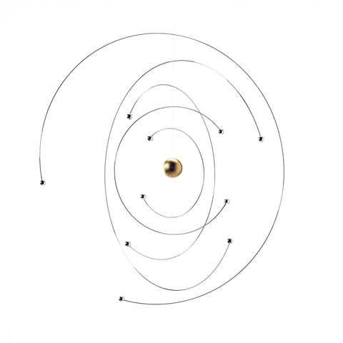 Model of planetary orbits with a central sun on a white background